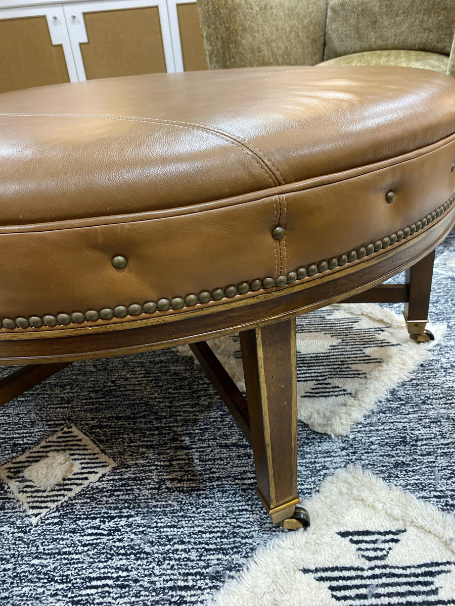 OTTOMAN BROWN LEATHER WITH PINNAIL DETAIL AND CASTERS