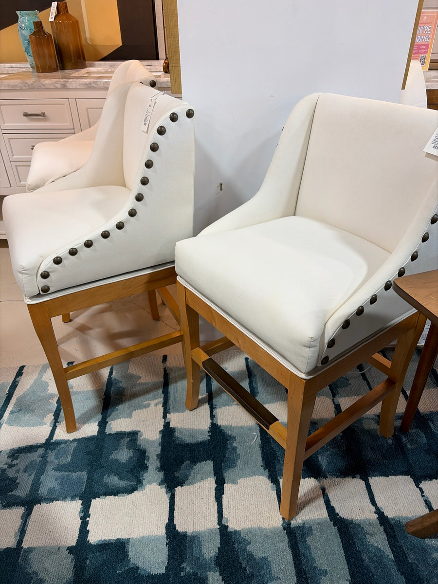 BALLARD PAIR  SWIVEL COUNTER STOOL CREAM SEAT  LIGHT WOOD BASE NAIL HEAD DETAIL