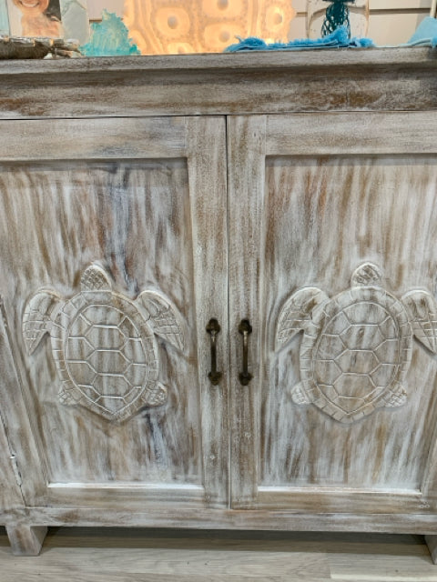 WHITE WASHED CONSOLE WITH 6 DOORS WITH TURTLE DESIGN