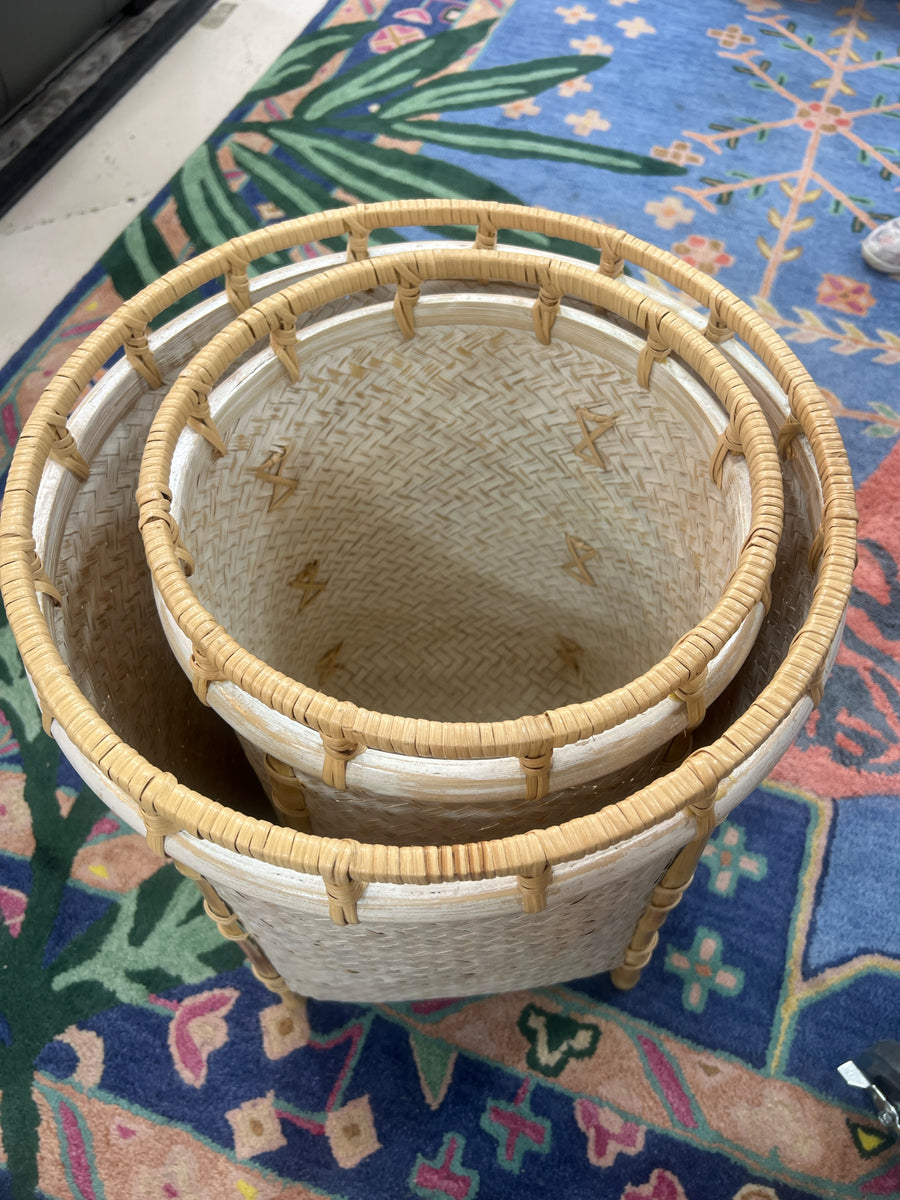 SET OF 2 WHITE RATTAN NESTING BASKETS WITH BAMBOO LEGS