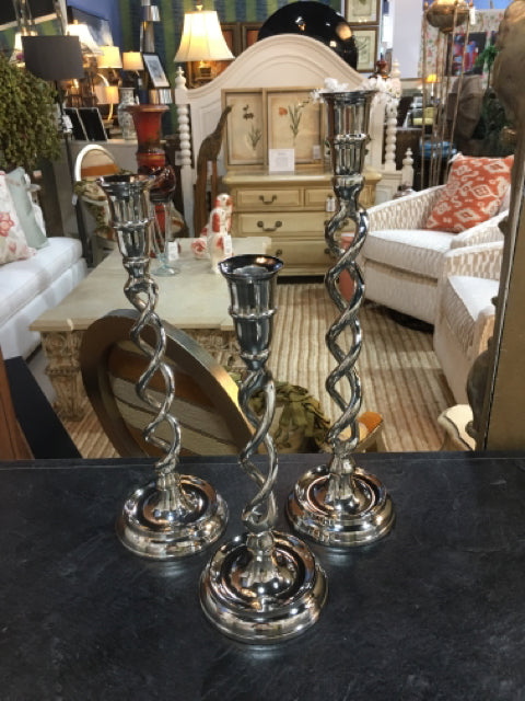 SET OF THREE SILVER TWISTED TAPER CANDLE HOLDERS