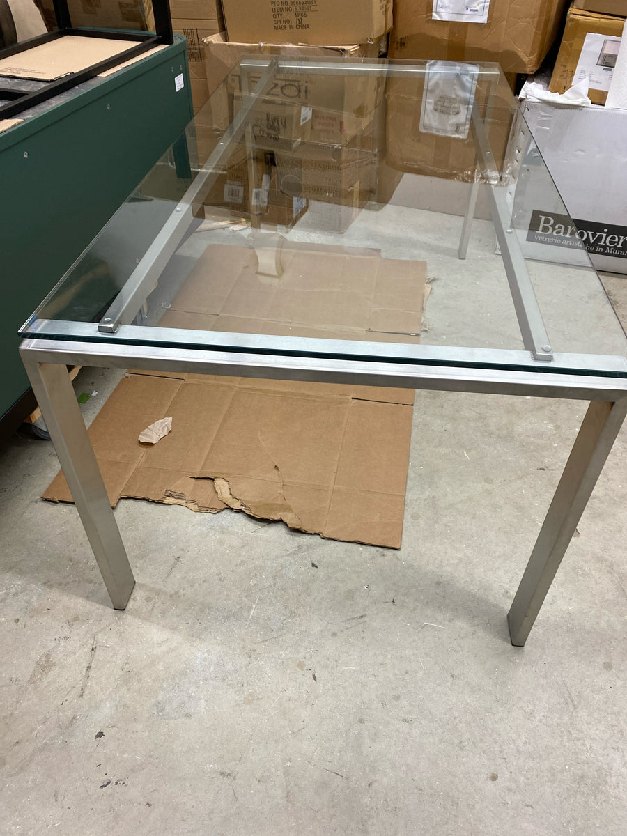 CRATE &  BARREL DINING TABLE GLASS WITH  STAINLESS LEGS